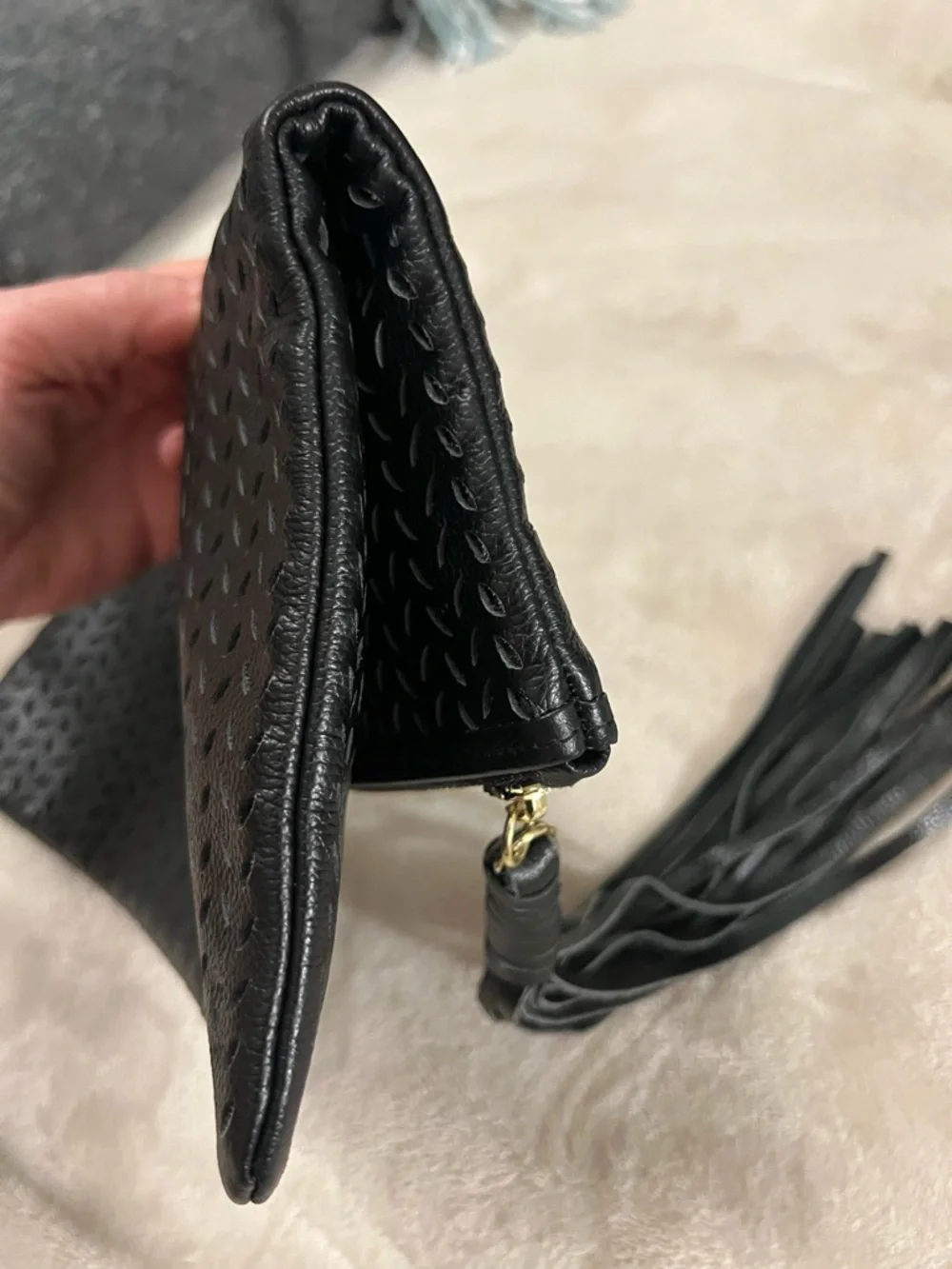 B-Low the Belt Perforated Leather Foldover Tassel Clutch